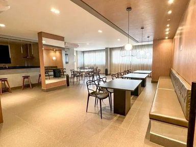 amplo salão de festas com espaço gourmet ultra moderno