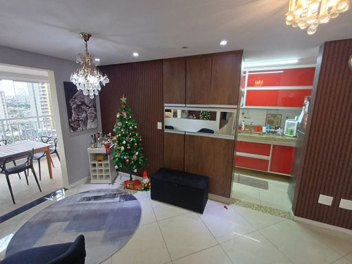 sala ampla dois ambientes com acesso a varanda gourmet envidraçada com vista livre e a cozinha