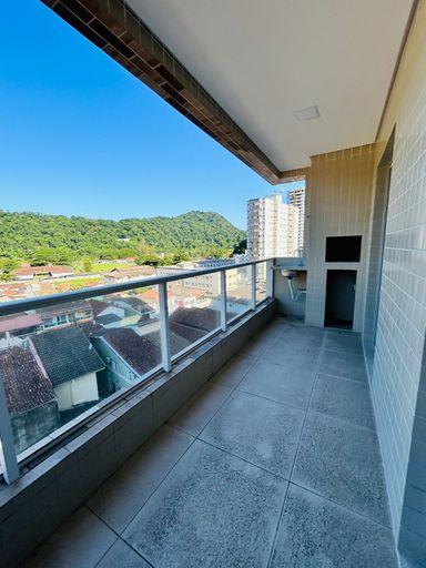 varanda gourmet com churrasqueira e vista privilegiada ao Morro do Xixová