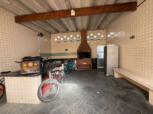 espaço gourmet com churrasqueira a carvão