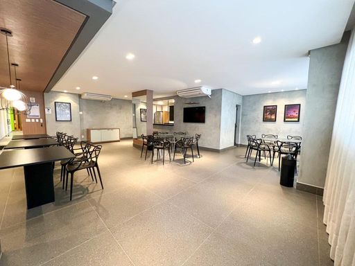 salão de festas com espaço gourmet em total requinte