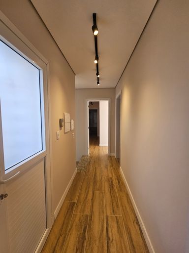 corredor que vai para os dormitórios