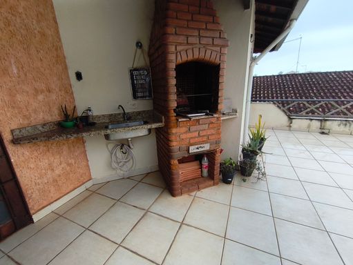 area gourmet com churrasqueira e lavabo