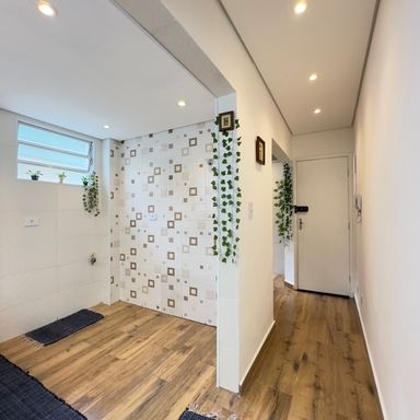 Corredor para acesso ao banheiro e área de serviço