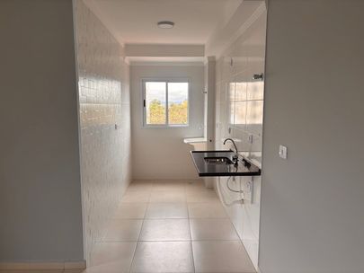 Cozinha integrada com àrea de serviço