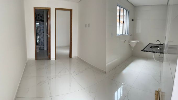 Vista da sala e cozinha integradas