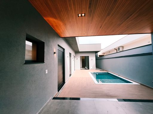 Vista da área gourmet à piscina
