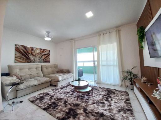 Sala ampla de dois ambientes.