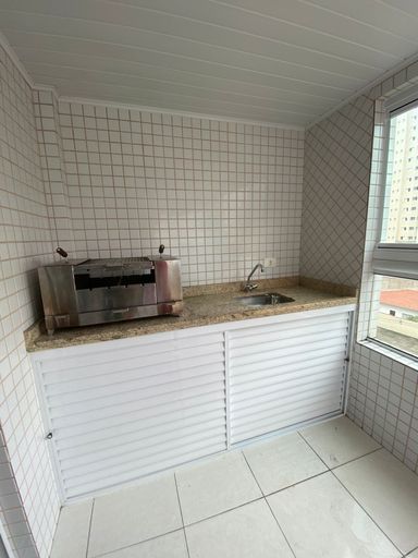 Sacada gourmet envidraçada.