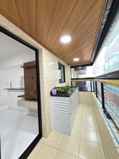 Sacada gourmet envidraçada.