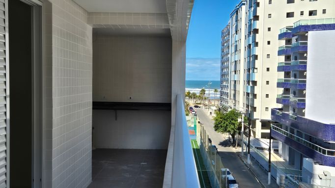 Sacada gourmet com vista para o mar.