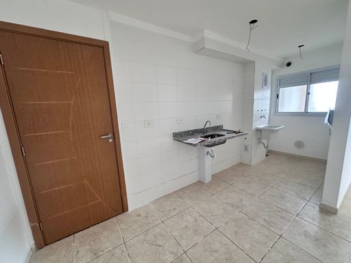 Cozinha com uma pia.