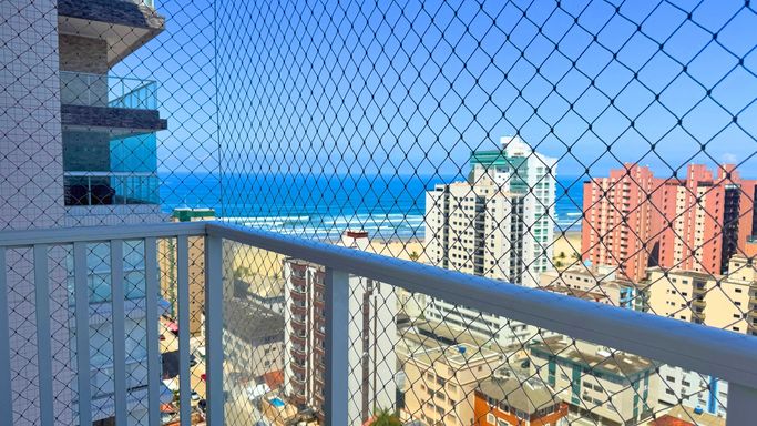Sacada gourmet com vista para o mar.