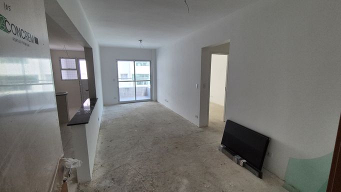 Sala de 2 ambientes com sacada gourmet.