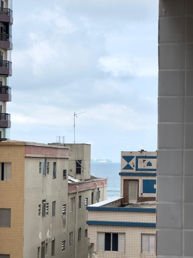 Vista parcial do mar da sacada gourmet.