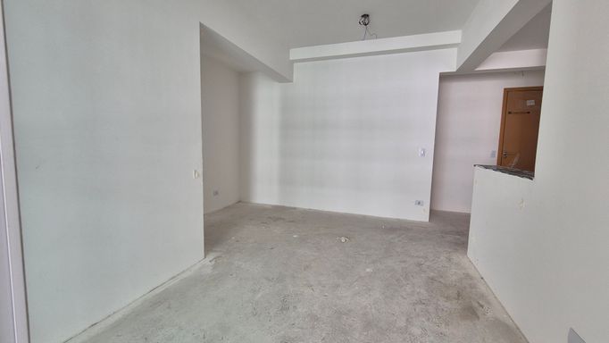 Sala de 2 ambientes com acesso a sacada gourmet.