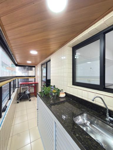 Sacada gourmet envidraçada.