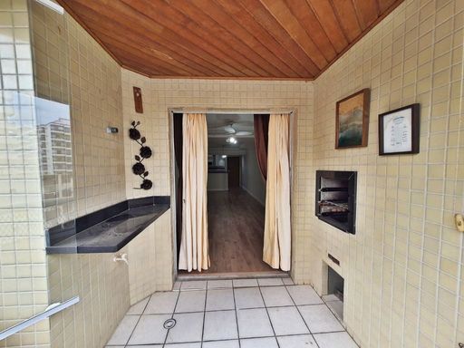 Sacada gourmet envidraçada.