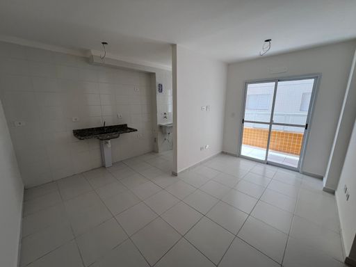 Sala de 2 ambientes integrada à cozinha.
