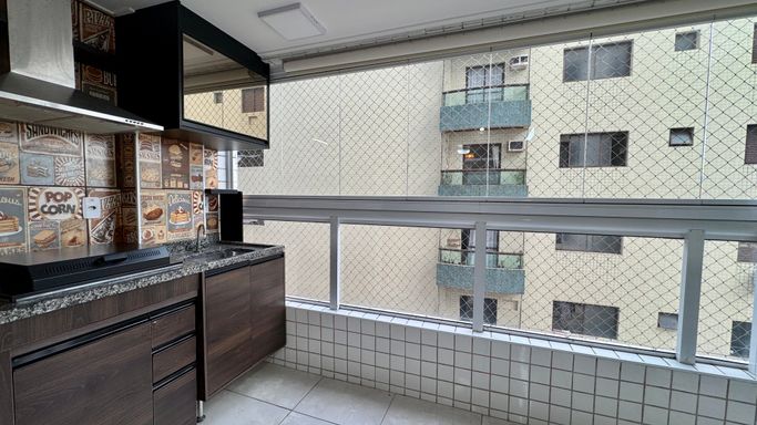 Sacada gourmet envidraçada.
