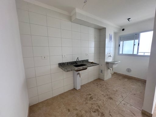 Cozinha com uma pia.