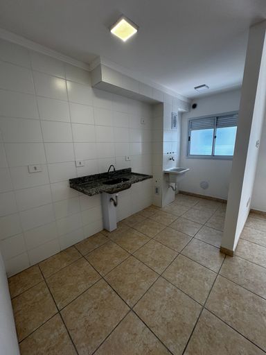 Cozinha com uma pia.