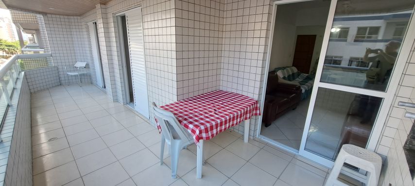 Sacada gourmet com vista para o mar.