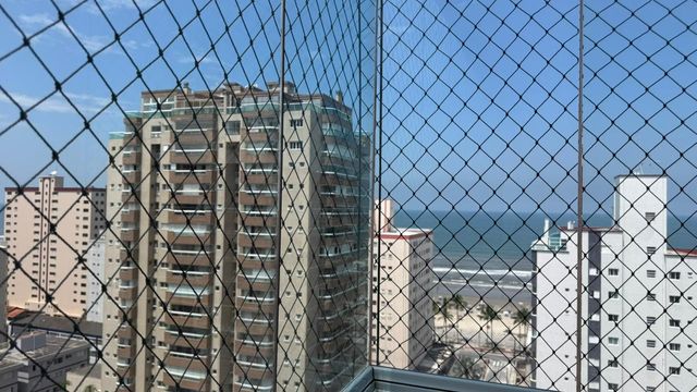 Vista para o mar da sacada gourmet.