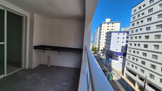 Sacada gourmet com vista para o mar.