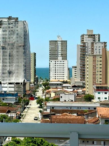 Vista para o mar da sacada gourmet.