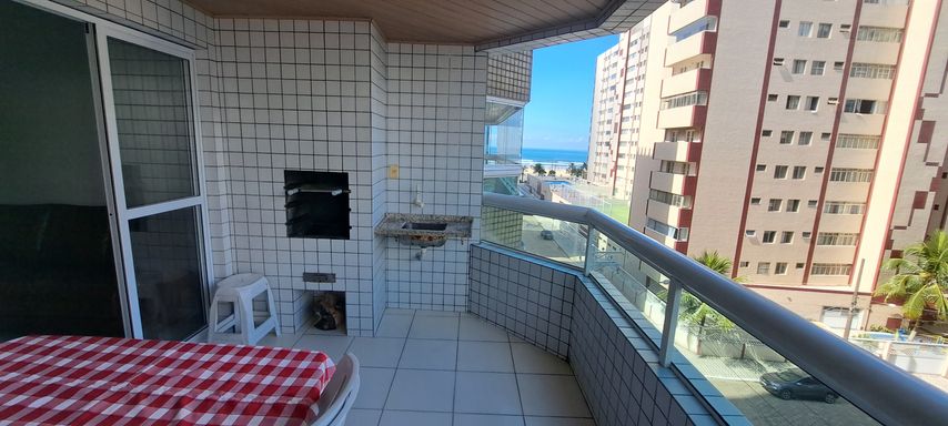 Sacada gourmet com vista para o mar.
