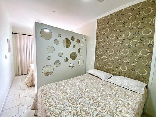 Dormitório com vista para o mar.