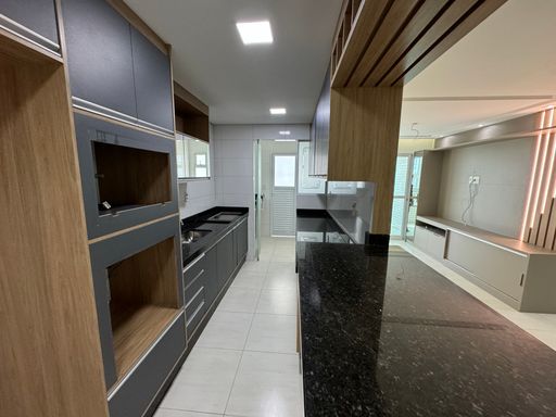 Cozinha americana planejada.