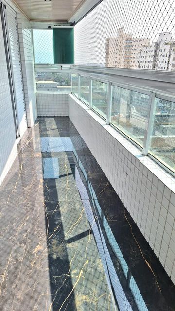 Sacada gourmet envidraçada.