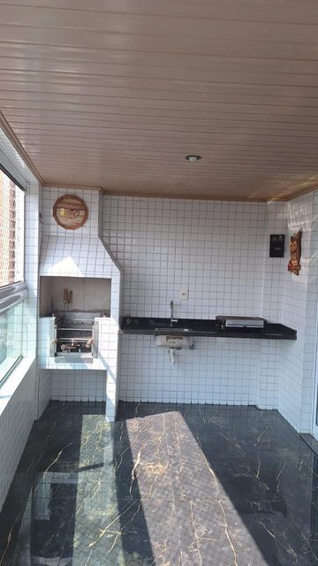 Sacada gourmet envidraçada.